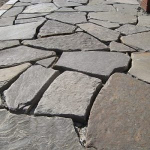 Blue honeycomb interlocking pavers. A close-up shot showing the pattern and texture of the pavers.